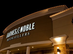 This bookstore is decorated with Christmas lights and wreaths.