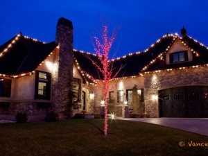 The rooftop is decorated with Christmas lights in a peppermint pattern.