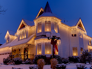 Clear icicle lights decorate this beautiful home.