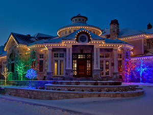 Each tree is a different color Christmas light.