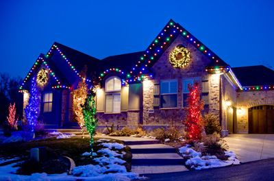 Wreathes decorate the peaks on this home.